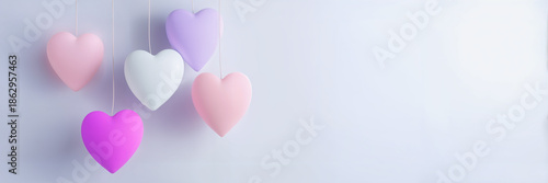 Pink Purple Hanging Hearts Valentine's Day Decorative Background, 3D Rendered Heart Shapes Romantic Holiday Theme with Soft Gradient Background.