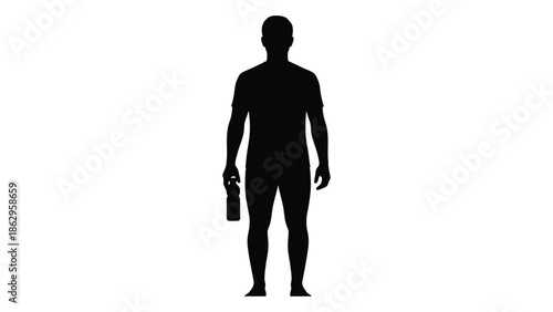 A stark silhouette of a man standing with a bottle in hand
