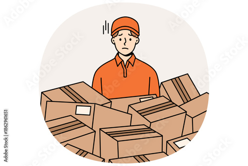 Sad man courier stands among scattered cardboard boxes, suffering from overload associated with logistics problems. Courier guy from delivery service or postal company needs help delivering parcels.
