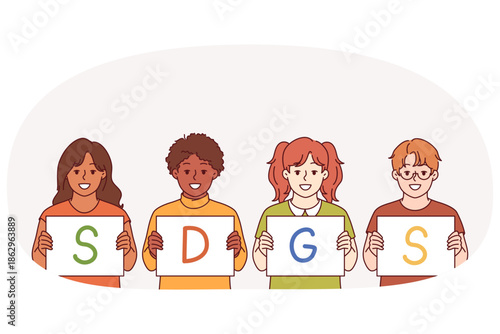 SDGS letters in hands of children calling to define and comply with sustainable development goals. Concept of SDGS plan to reduce emissions and develop economy for comfort of future generations