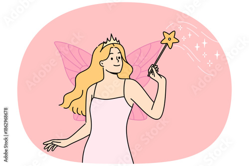 Fairy woman with magic wand performs sorcery, standing with wings behind back, dressed in dress and crown. Sorceress girl from fairy tale about cinderella flew in to help cope with difficulties