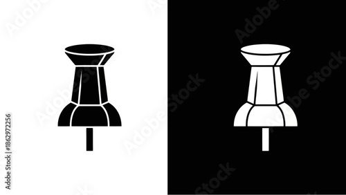 Black and white illustration of a push pin on contrasting backgrounds.