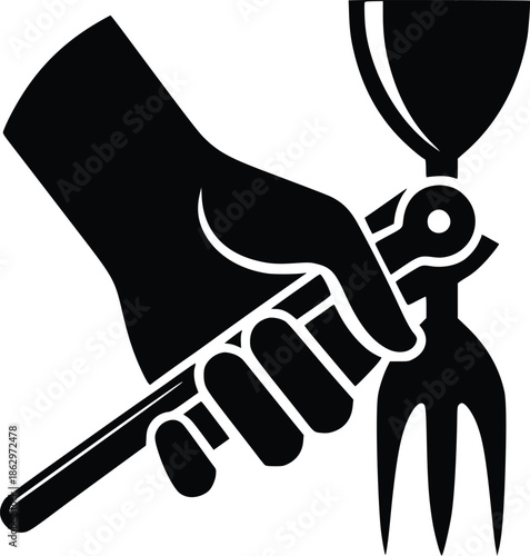 A black silhouette of a hand holding a gardening fork