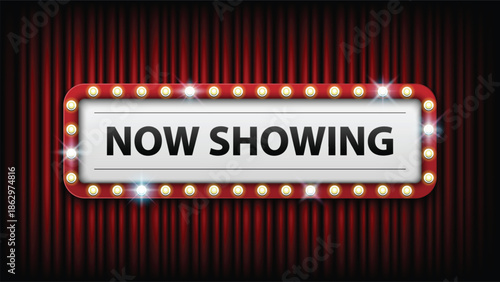A movie theater sign that reads now showing