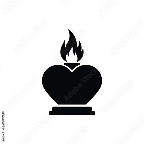 Black silhouette of heart shaped lamp with flame