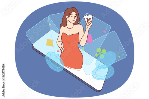 Woman winner of poker tournament in mobile casino looks out of phone and holds playing cards in hand. Girl urges to download casino or gambling app for smartphone to have good time