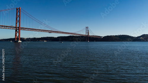 Schilderij op canvas The 25 de Abril (April 25th) Bridge, over the river Tagus, connecting Lisbon wit
