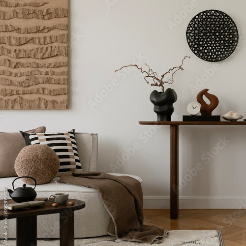 Fotografie Elegant console table styling with artistic sculptures, ceramics, and decorative elements