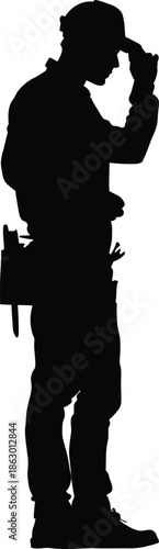 A silhouette of a man in a thoughtful pose