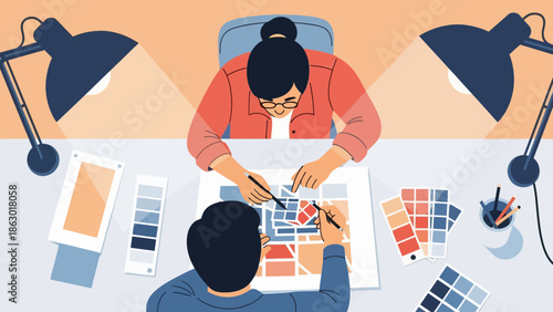 Two designers collaborating on color palette project in modern workspace