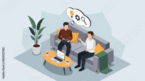 Two businessmen discussing ideas in modern living room with laptop and coffee