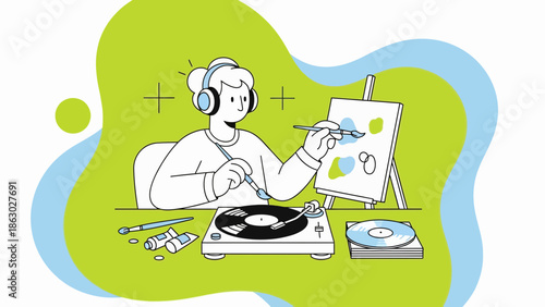 Creative person painting on canvas while listening to music on vinyl records