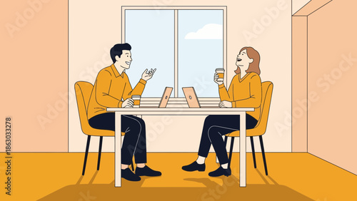 Colleagues in casual business attire collaborating over laptops at modern office table