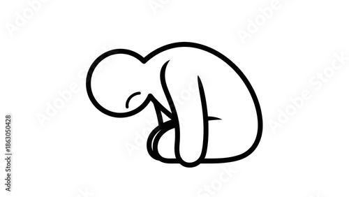 Person sitting in sad posture with head down