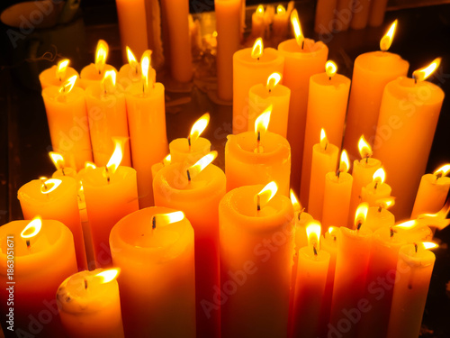 Warm glow of flickering candles creating cozy ambiance