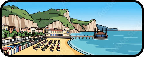 Coastal town with beach huts, pier, and a seaside building beneath green hills