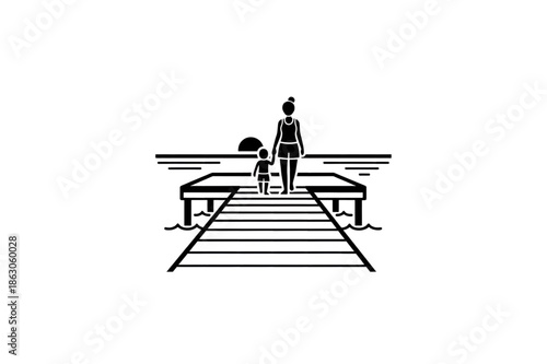 Mother and child standing on wooden pier at the beach silhouette.