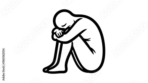 Person sitting on floor with head in hands