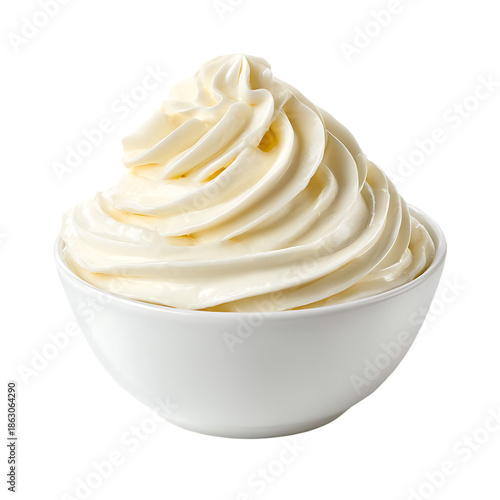 Thick heavy cream in a white bowl with silky texture