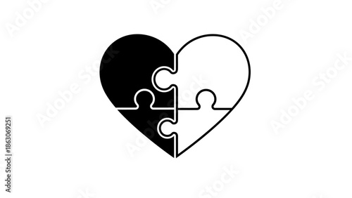 Black and white heart shape made of four puzzle pieces, symbolizing love and connection.