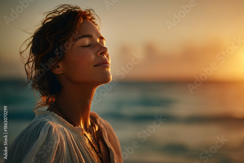 Woman relaxing breathing fresh air on the beach