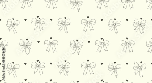 Sweet seamless pattern of hand drawn ribbon bows and small dark hearts arranged on a warm cream background for wrapping paper.
