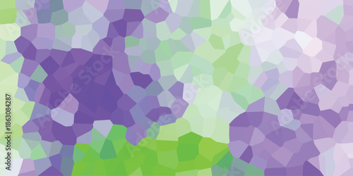 Vibrant abstract mosaic of irregular polygons in shades of purple, green, and white, creating a colorful and geometric background pattern for creative digital art and design projects