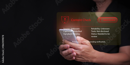 A man holding smartphone with red warning interface showing unverified content, information check, misinformation, fake news, unknow origin, digital risk, data uncertainty, and online review alert.