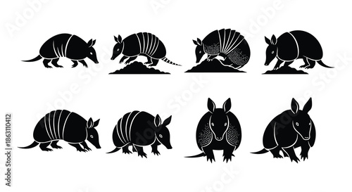 Black and white illustration depicting several armadillos in different poses
