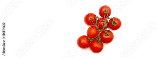 Fresh red tomatoes grouped together on a white background ready for cooking or garnishing dishes at home