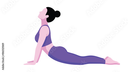 A woman practices the cobra pose a yoga asana for spinal flexibility and strength