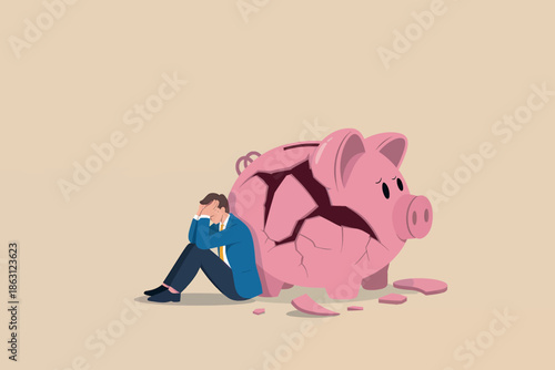 Businessman in despair next to a shattered piggy bank symbolizing financial loss and crisis