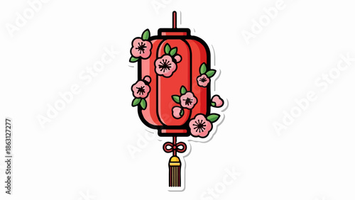 Red lantern with pink blossoms and green leaves hanging with a gold tassel