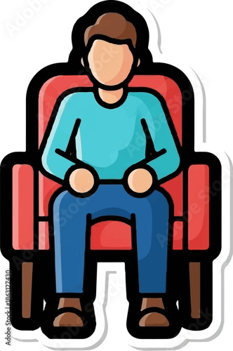 Person sitting in a red armchair wearing a blue shirt and jeans