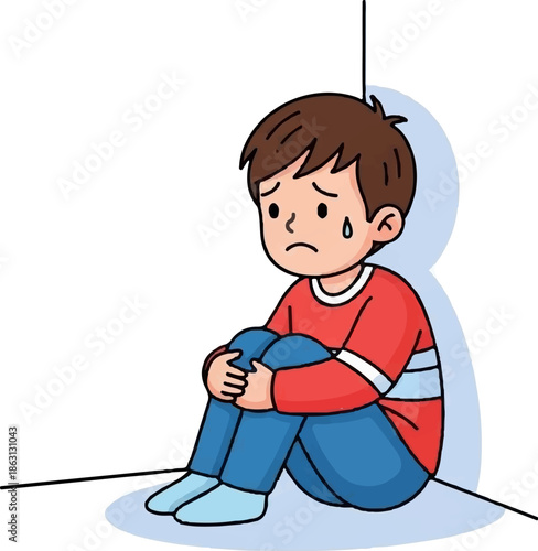 Sad boy crying in corner