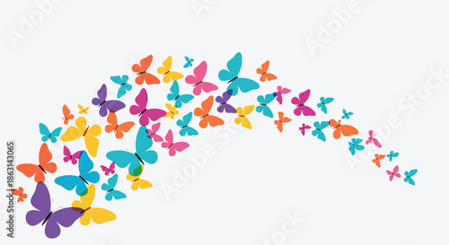 Vibrant swarm of colorful butterflies of various sizes flying together in a graceful curved trail over a plain white background.