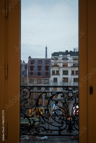 The Eiffel Tower and the magnificent buildings of the Champs-Élysées at the end of the day 1