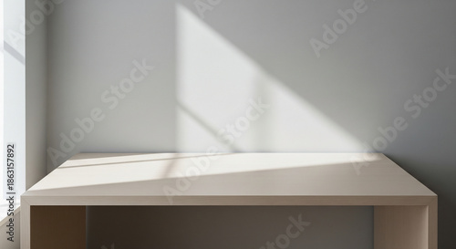 Empty minimalist desk with soft light