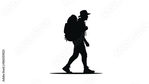 A lone hiker walking with a backpack a dramatic outdoor silhouette