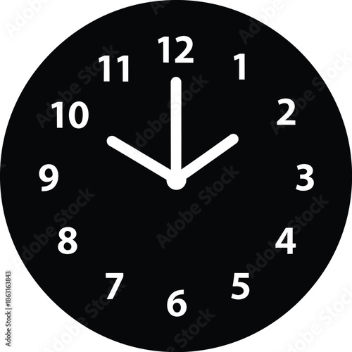 A simple black and white circular clock face indicating the time as 9 o'clock