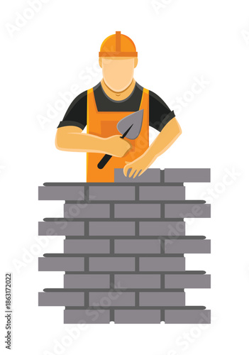 Construction worker building a brick wall with trowel