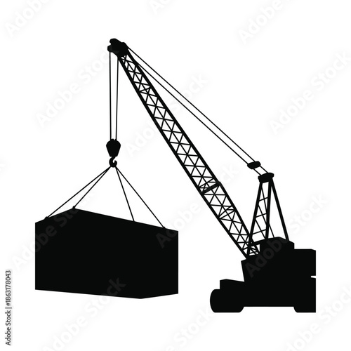 Silhouette of a construction crane lifting a large rectangular cargo box