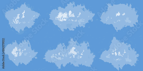 A collection of fluffy white clouds scattered across a vibrant blue sky