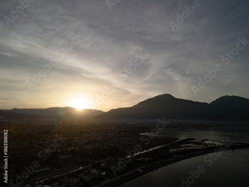 Majestic mountain peaks illuminated by the first light of sunrise