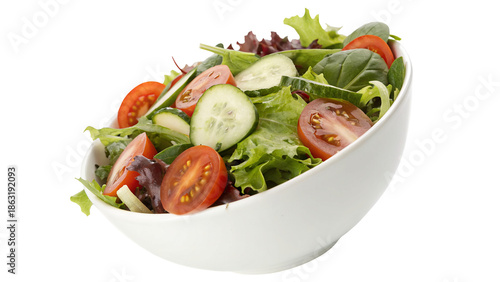 Fresh mixed green salad with tomatoes and cucumbers in white bowl