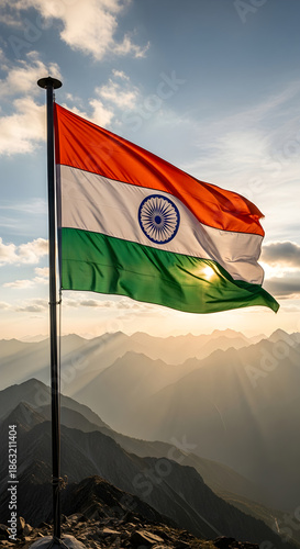 Independence of Indian nation with flag waving on top of mountain during 26 January Republic Day and 15 Agust morning sunlight showing Independent pride freedom spirit of India landscape. 