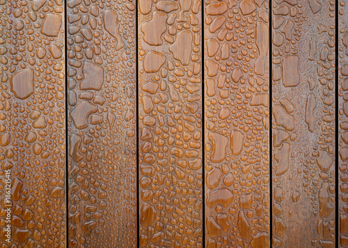 Water droplets on wooden planks background