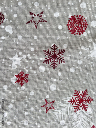 Christmas fabric with red snowflakes and white stars pattern
