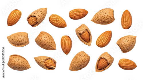 Almonds and almond shells scattered isolated on transparent background