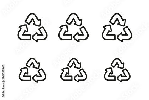 Recycle Symbols on Dark Textured Background